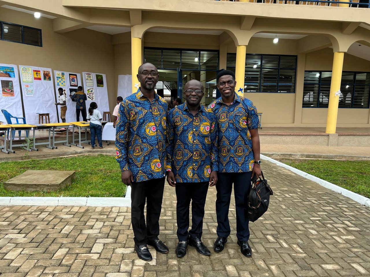 Akatakyie members in matching anniversary cloth on the Opoku Ware School campus in Kumasi